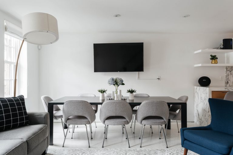 Modern living dining room in white, grey, blue